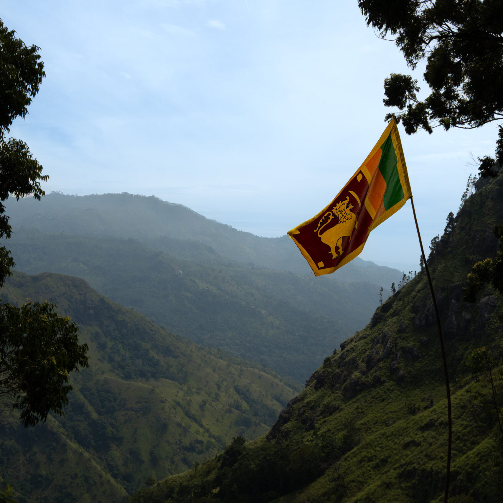 Free views in Ella 2026 of the surrounding nature with the Sri Lankan flag, a budget-friendly activity.