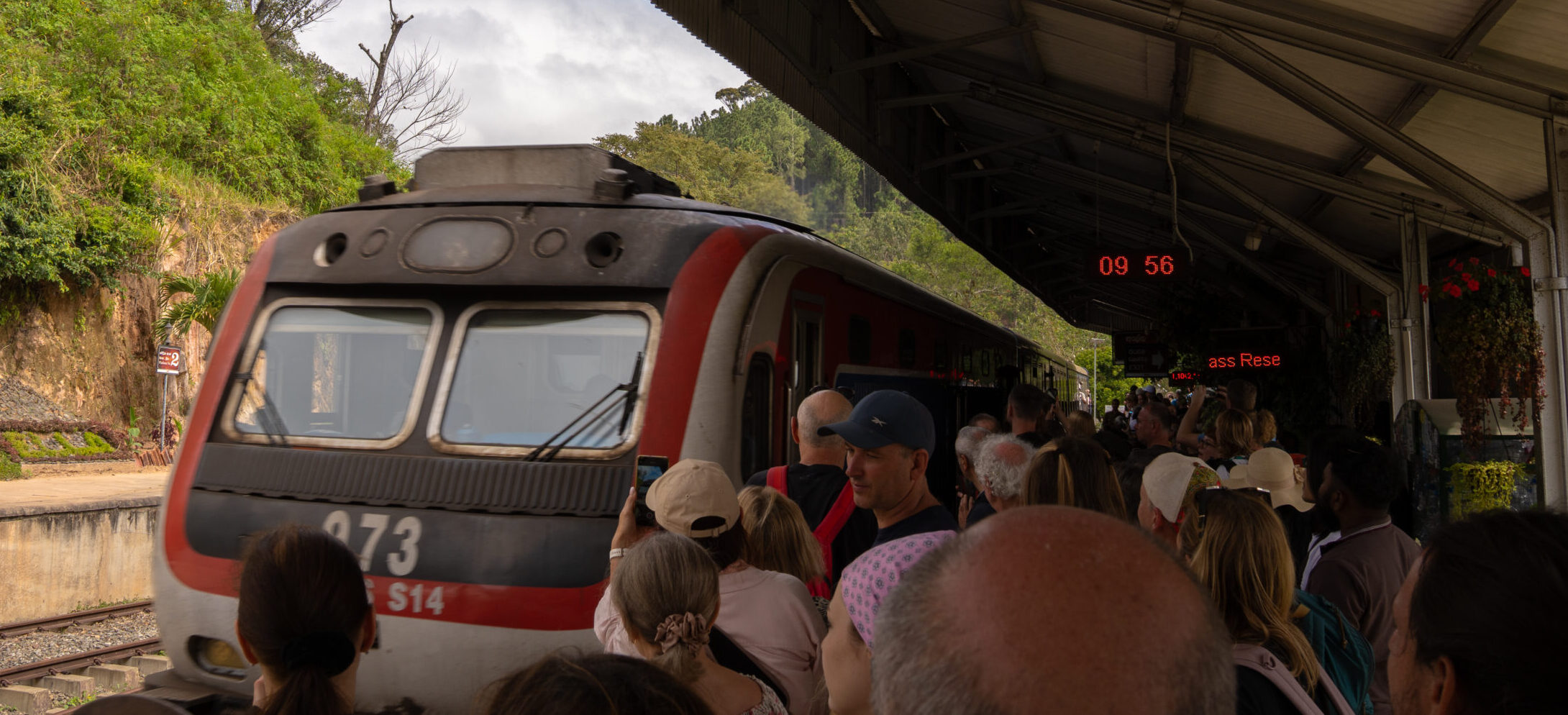 The extremely busy and chaotic platform of travellers waiting to board the iconic Ella to Kandy train running to Ambewela for only 140 LKR