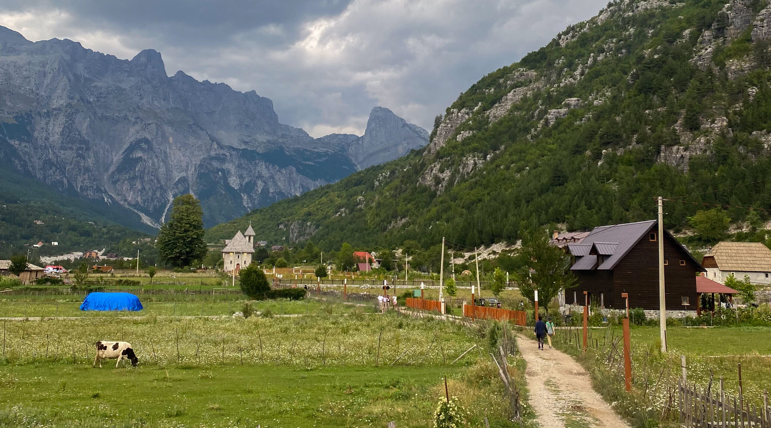 The end of the Valbona to Theth hike, the mountain village of Theth in the accursed mountains