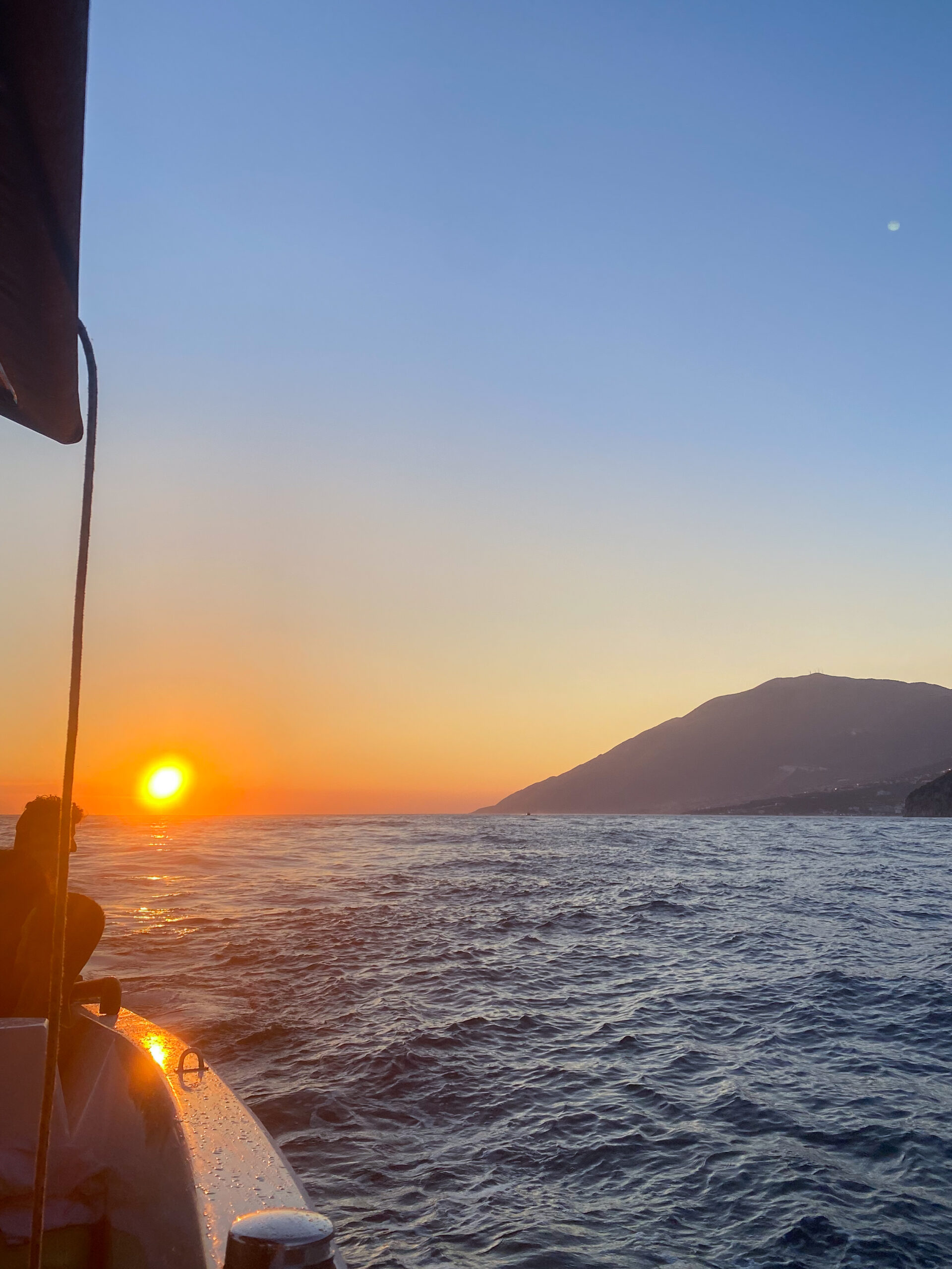 The golden sunset from a boat trip in Himarë
