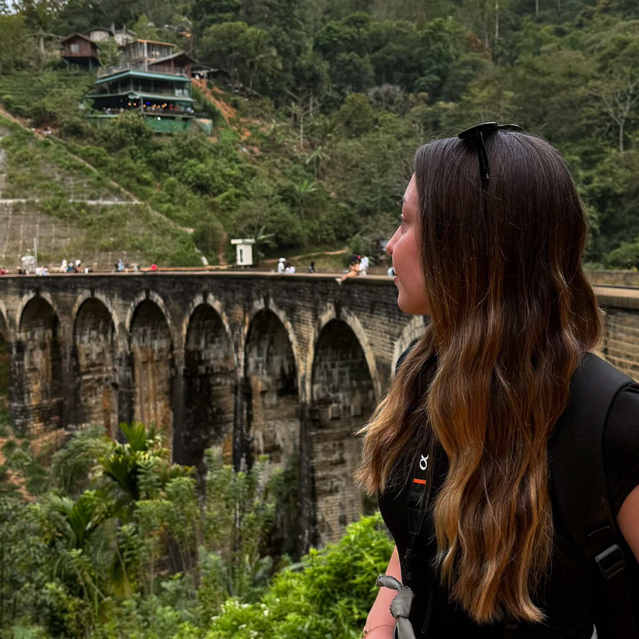 A women stood at the nine arch bridges in Sri Lanka's highland town of Ella.