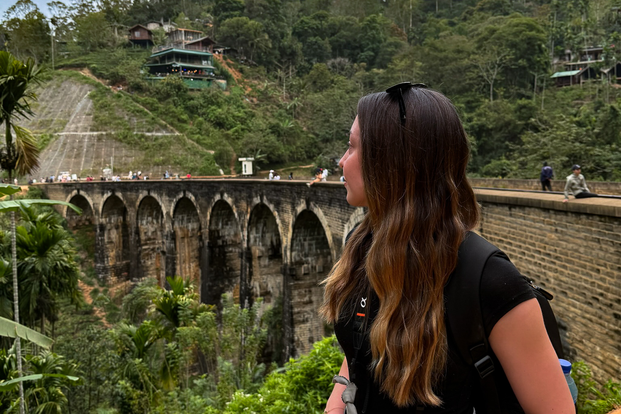 A women stood at the nine arch bridges in Sri Lanka's highland town of Ella.