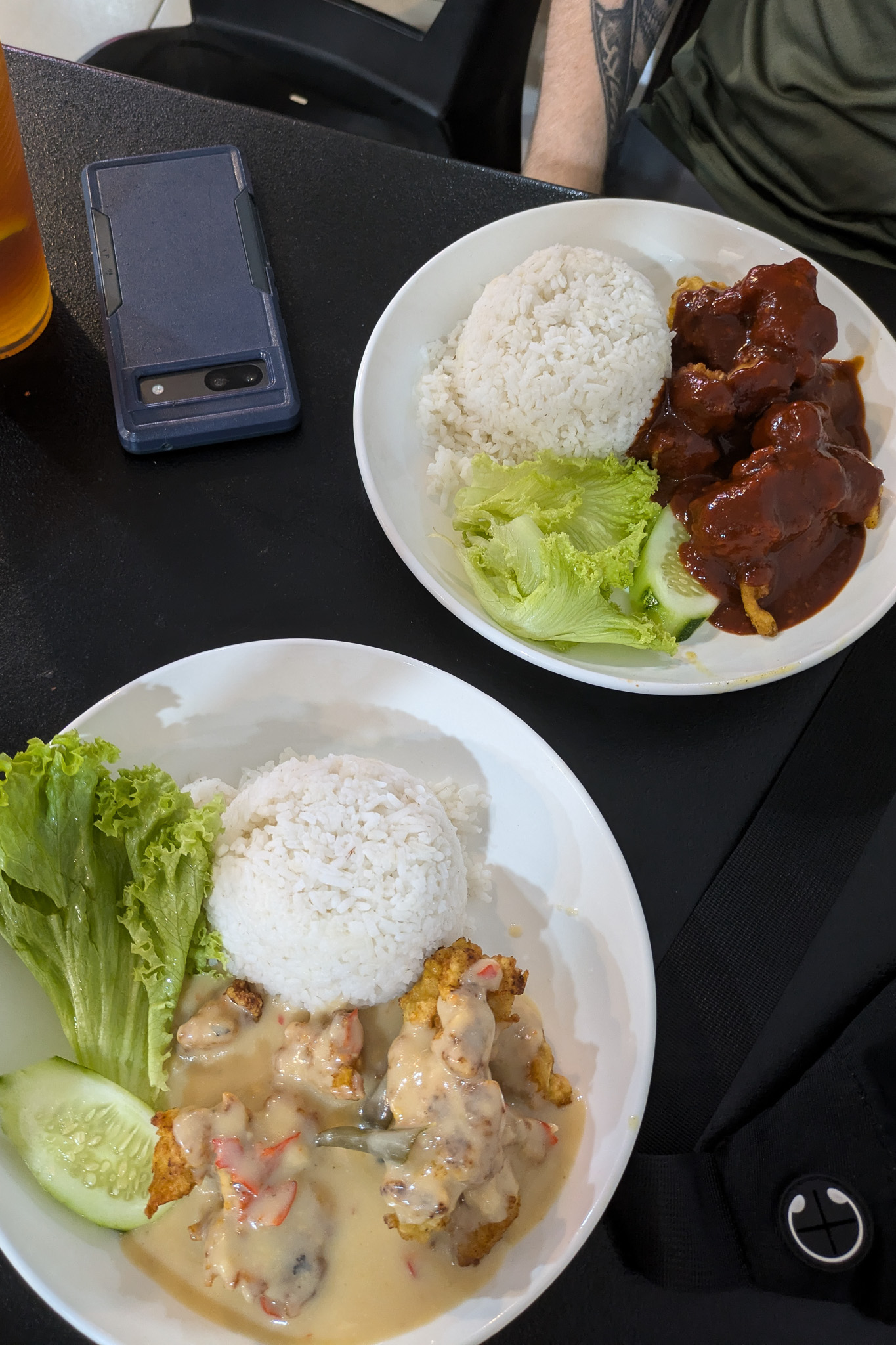 A plate of rice and meat at a local establishment in Malaysia