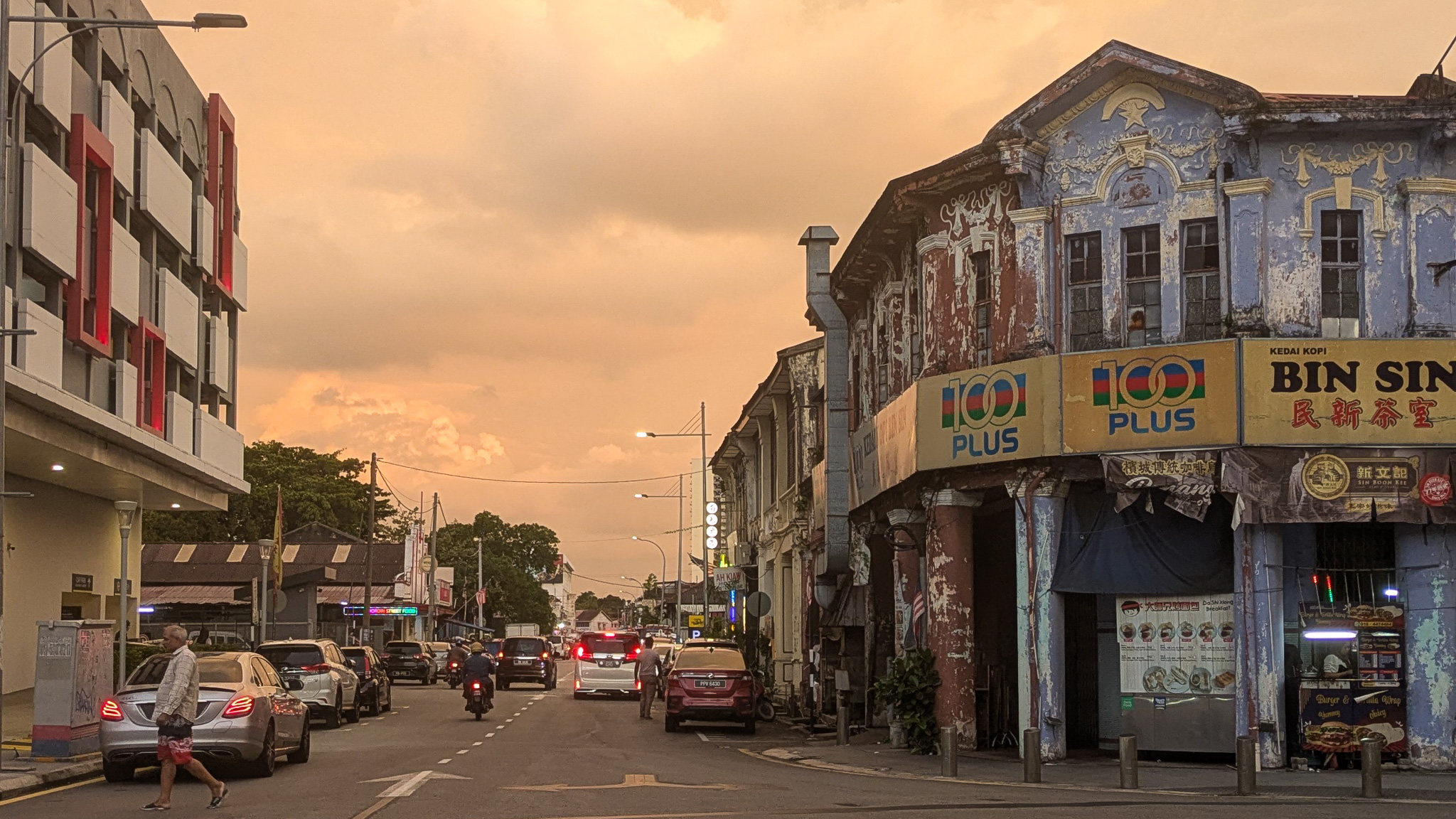 An orange sky over the colonial, rustic style buildings in Georgetown, Penang