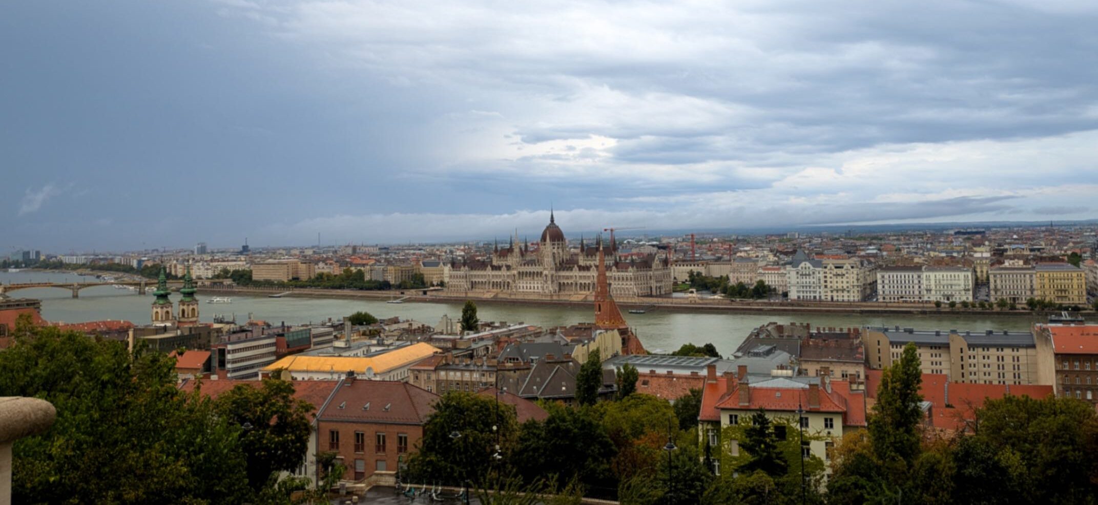A view of the Hungarian Parliament building from an elevated view.