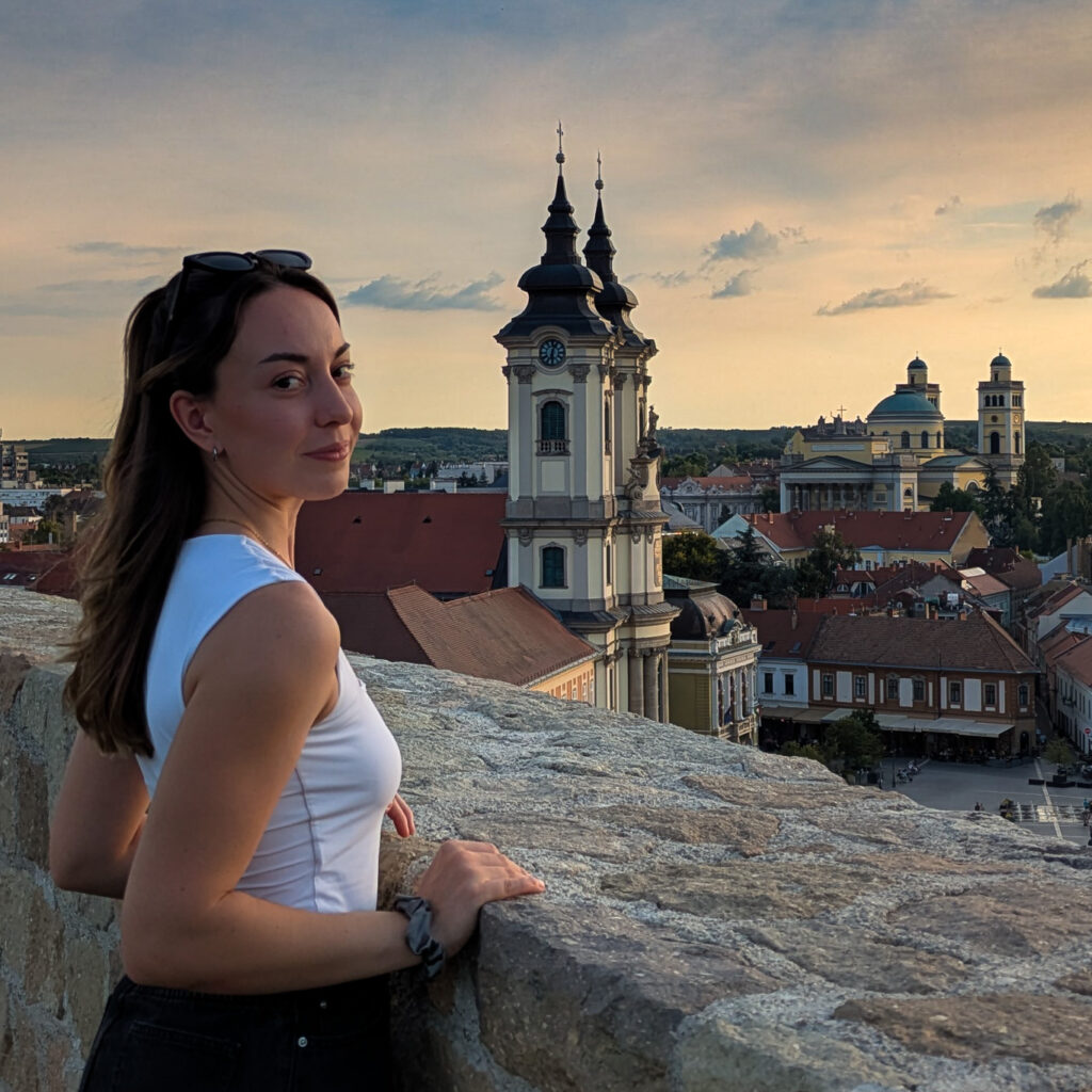 The gorgeous views of Eger from Eger castle as the sun sets over a beautiful city in Hungary