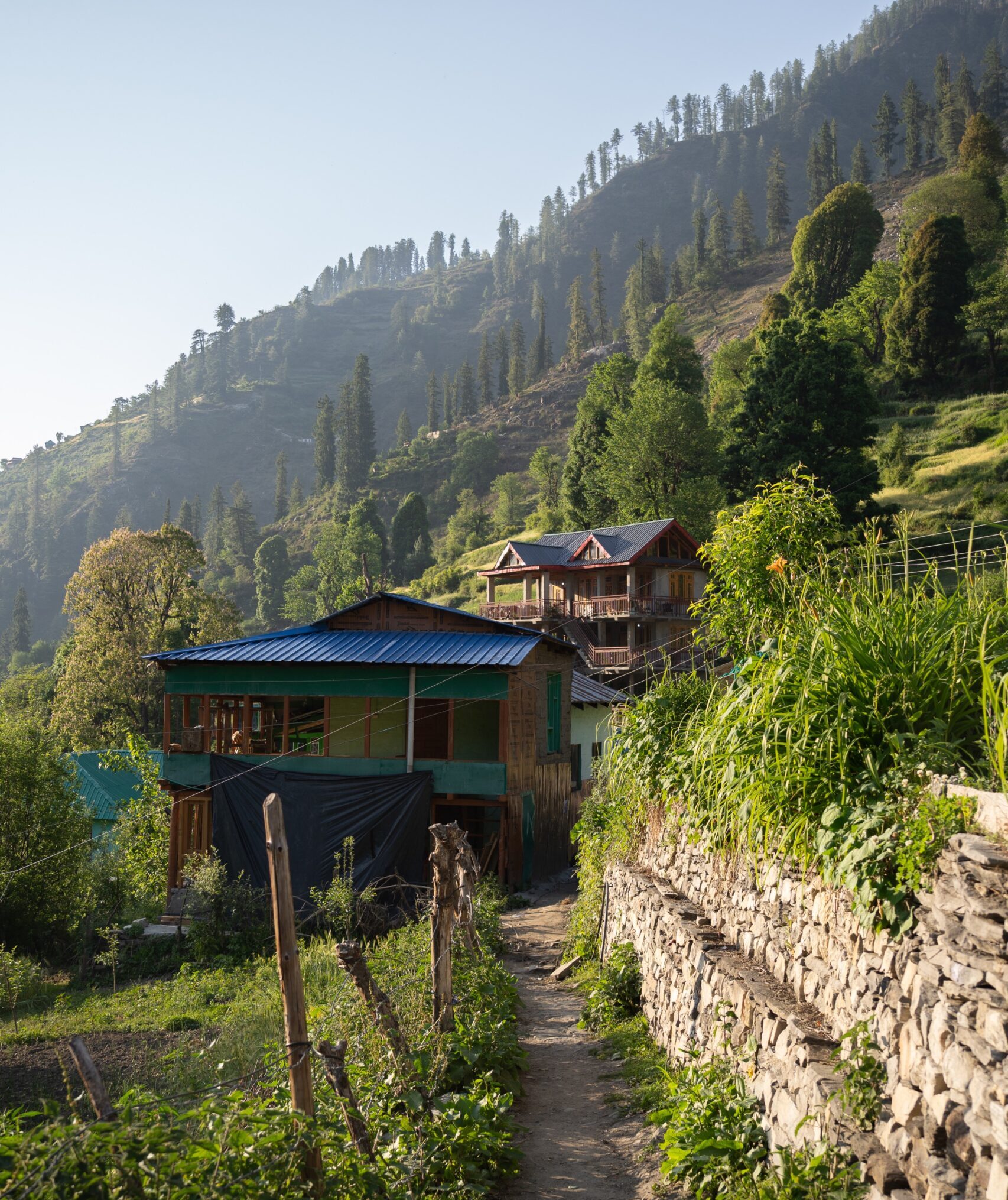 Traditional homes sat along a walkway on the edge of Grahan Village