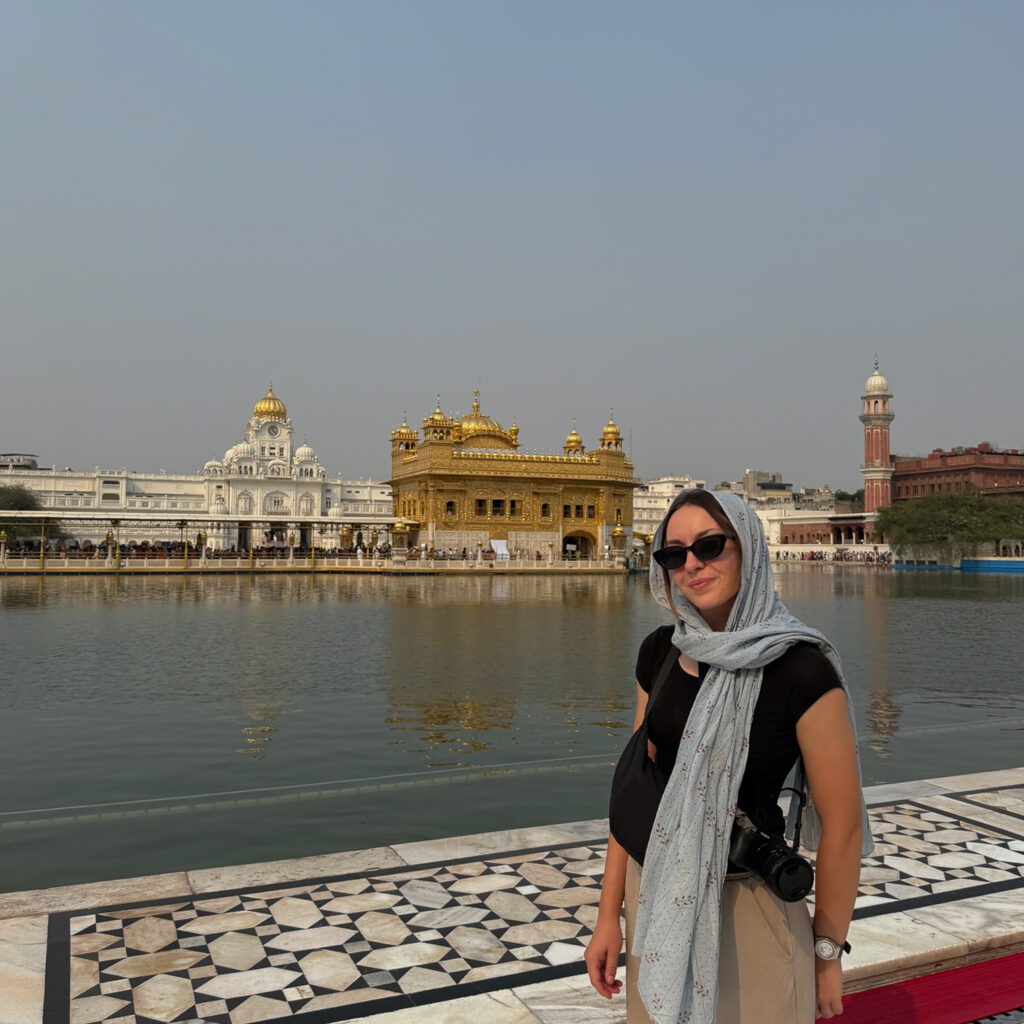 A women stood inside the Golden Temple, Amritsar, India