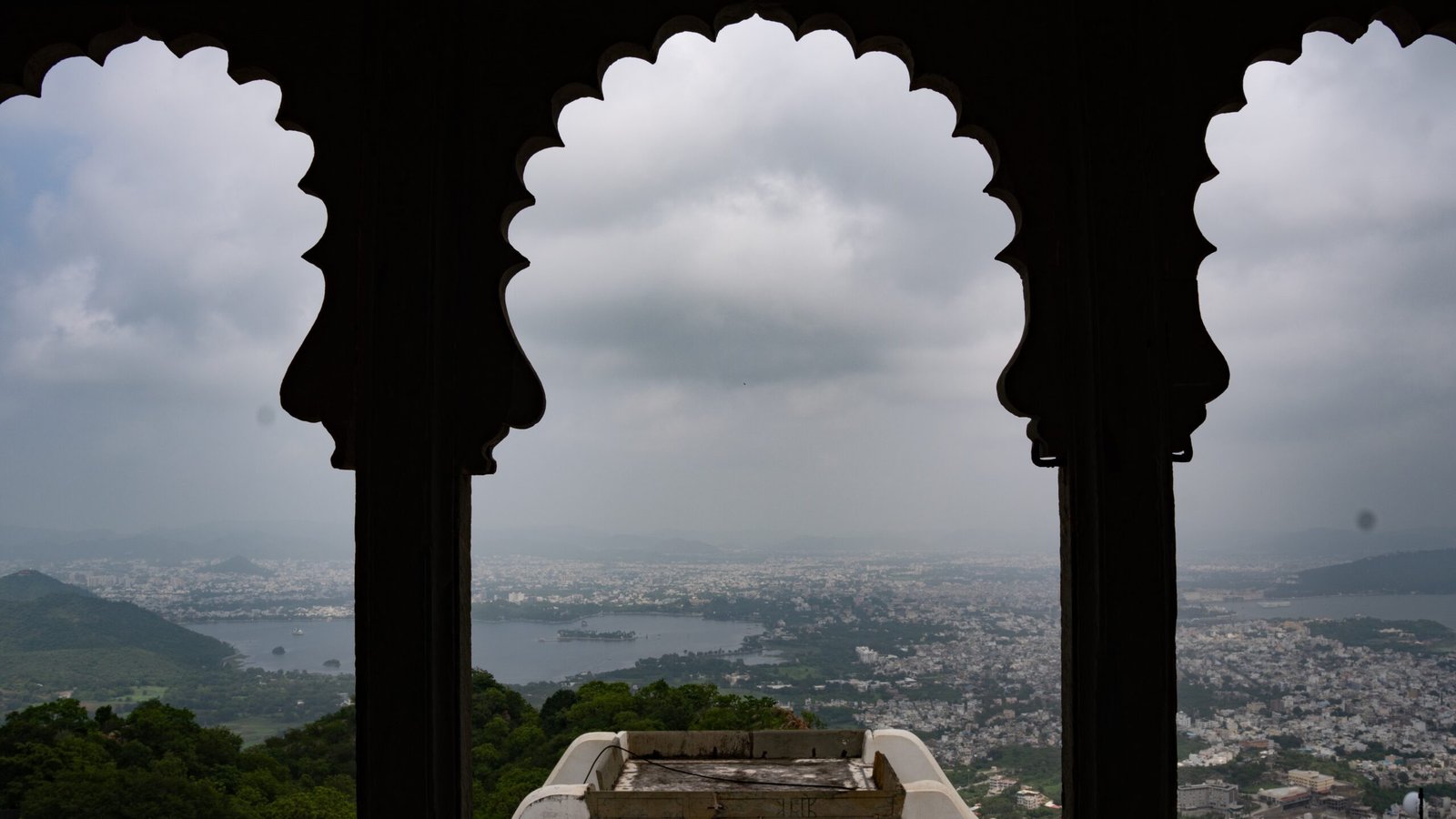A traditional Rajasthani architecture with a view of Udaipur below