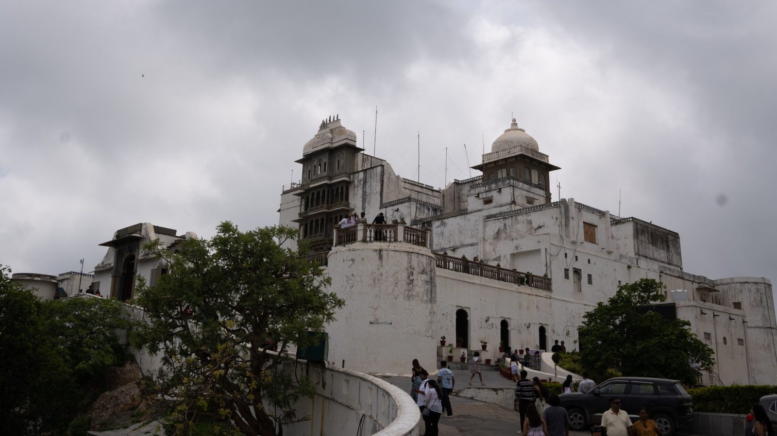 A large white marble building known as the Monsoon Palace in Udaipur