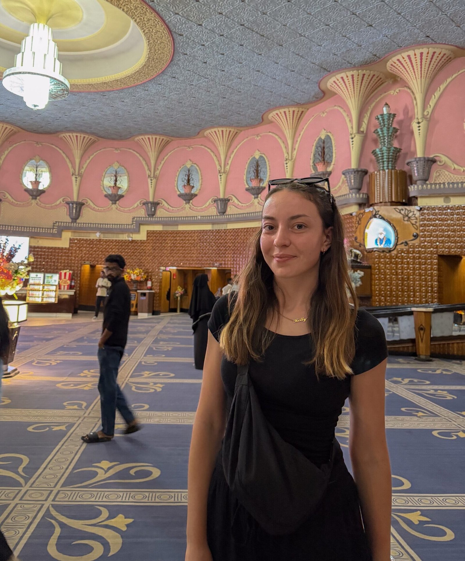 A women stood inside an old cinema in jaipur