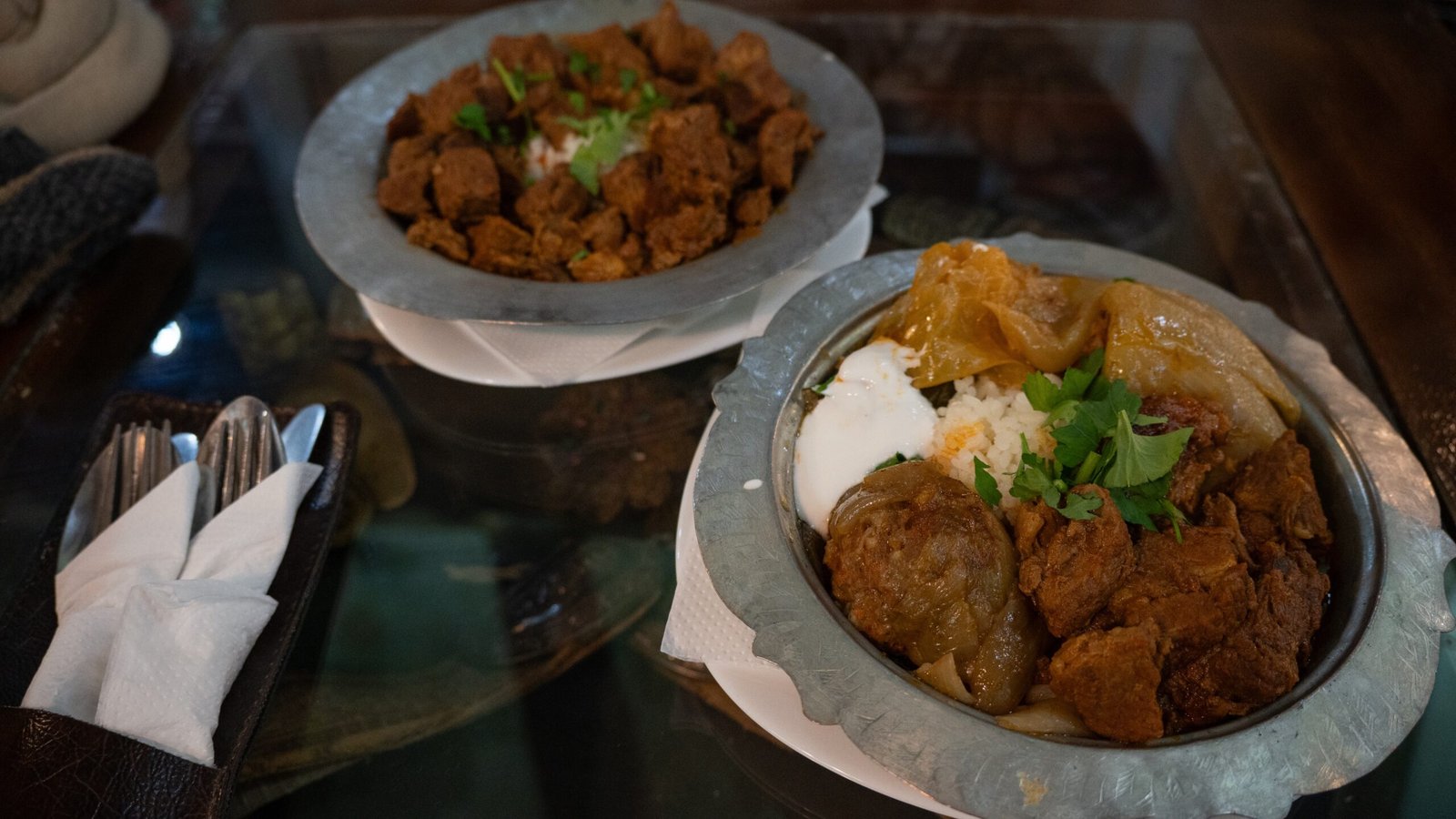 Hearty meals in dishes with cutlery